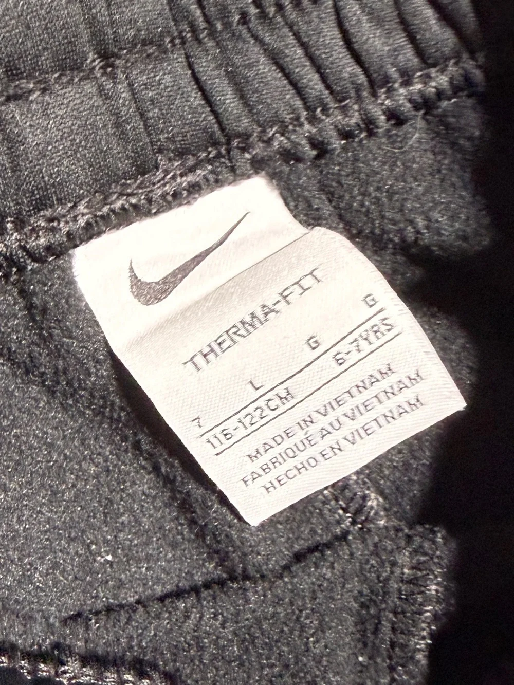 Nike Kids Black Sweatpants with Red Side Panels